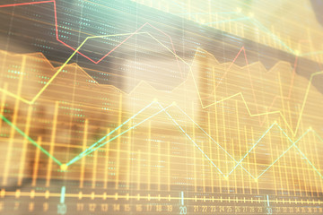 Stock market chart with trading desk bank office interior on background. Double exposure. Concept of financial analysis