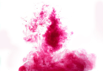 Poster color in water. Abstract background., Color paint drops in water. Ink swirling underwater,...