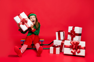 Nice attractive cheerful cheery glad funny pre-teen elf carrying holding fairy miracle cool...