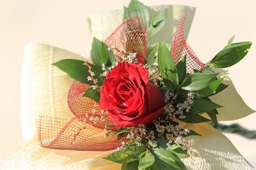 Small bouquet with one red rose