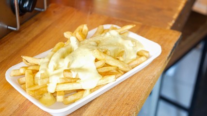 French fries with cheese sauce