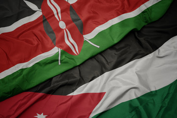 waving colorful flag of jordan and national flag of kenya.