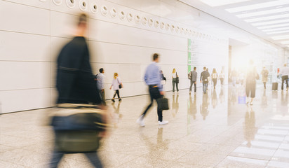 blurred business people at a trade fair