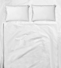 Fototapeta na wymiar bedding sheet pillow bed sleep bedroom white