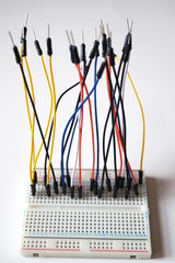 Jumper cables on a prototyping breadboard 