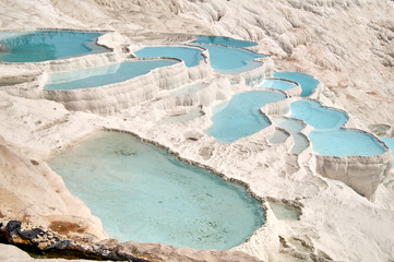 Natural view on travertine pools and terraces in Pamukkale. Cotton castle in southwestern Turkey
