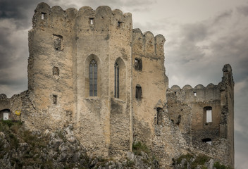 Aerial view of Beckov castle with restored Gothic chapel in Slovakia above the Vah river