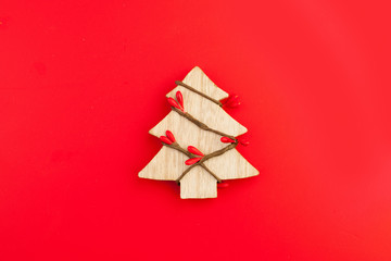 Christmas tree on red card background