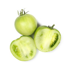 Fototapeta na wymiar Half green unripe tomatoes isolated on white background, top view