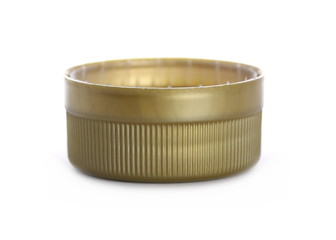 Golden new plastic bottle cap isolated on white, side view, macro