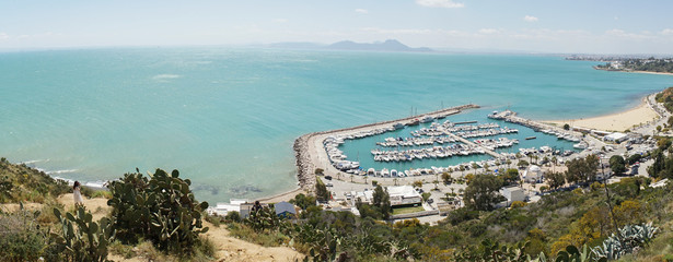 Marina with boats and yachts in the old part of Sidi Bou Said village in Carthage, Tunisia.