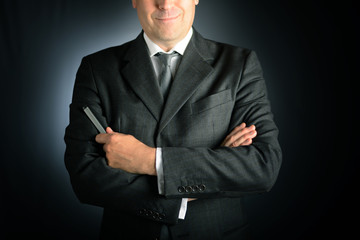 Businessman hand pressing an imaginary button on virtual screen