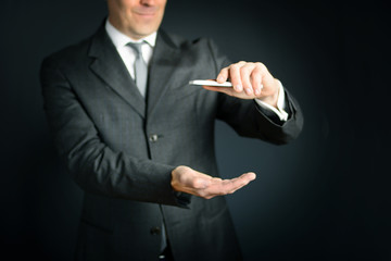 Businessman hand pressing an imaginary button on virtual screen