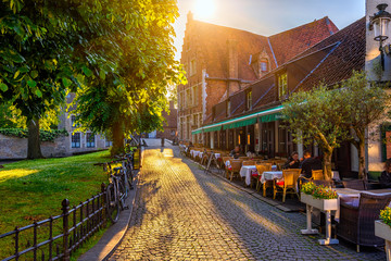 Fototapeta premium Old street of the historic city center of Bruges (Brugge), West Flanders province, Belgium. Cityscape of Bruges.