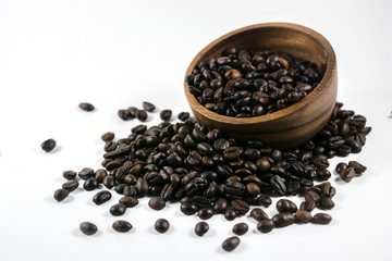 coffee in wooden spoon isolated on white