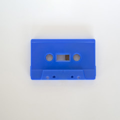 Obraz premium Blue cassette tape top view close-up shot