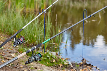fishing rod with reel on stand