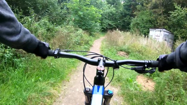 MTB bicycle riding on the trails in the summer season