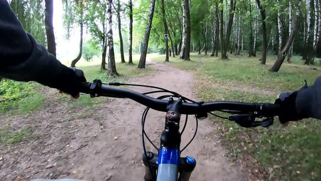 MTB bicycle riding on the trails in the summer season