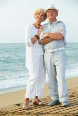 happy couple man and woman near the sea