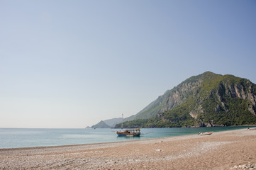 Landscape of the mountain covering by tree near the sea