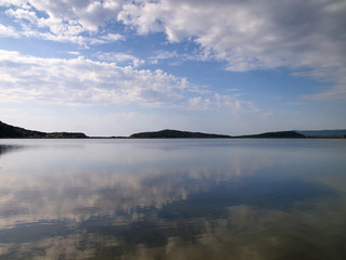 Sky mirroring on water surface, Gialova sea lagoon, Peloponesse, Greece.