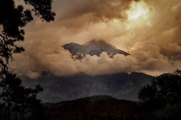 Landscape of the mountain Tahtali in the fluffy brown clouds