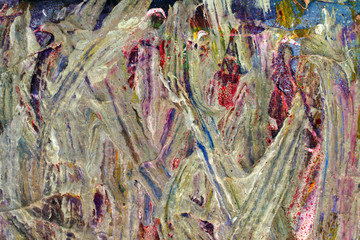Palette with wet paint. Colorful stains of acrylic paint. Mixture of variegated hues