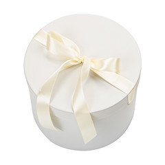 White round cartoon gift box with cream color bow isolated on white background