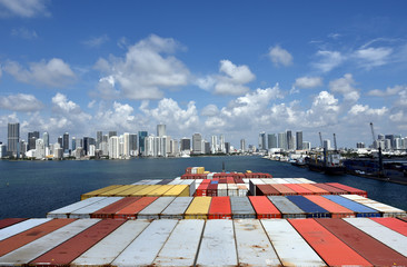Large cargo container ship entering port of Miami. View from the navigation bridge.	