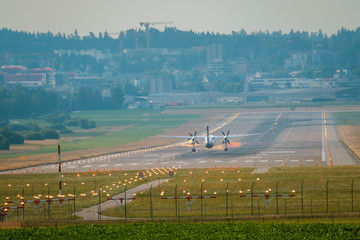 Airplane landing at airport runway