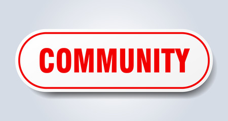 community sign. community rounded red sticker. community