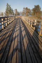 Fototapeta na wymiar Old wooden bridge, Valaam, Karelia, Russia.