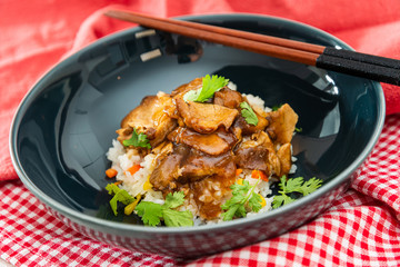 Asian style caramel pork with rice and vegetable