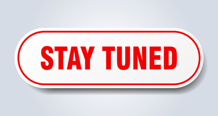 stay tuned sign. stay tuned rounded red sticker. stay tuned