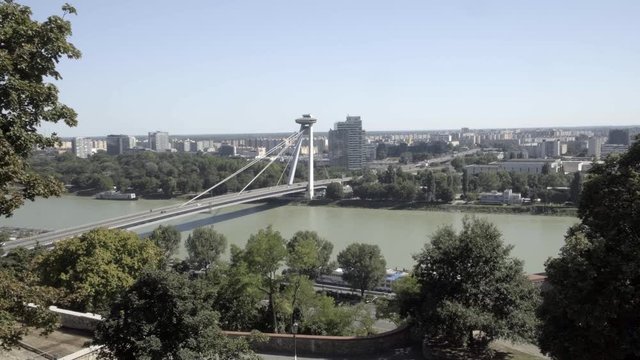 BRATISLAVA, SLOVAKIA - AUGUST 18, 2019: Most SNP ("Bridge of the Slovak National Uprising") or the UFO Bridge,is a road bridge over the Danube. View from the castle