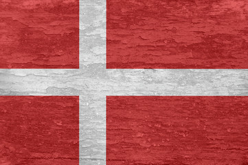 Fototapeta premium Denmark flag on an old painted wooden surface.