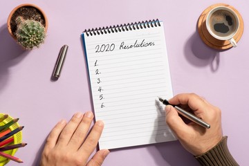 To Do list For New Year 2020, Over Head View Of Work Desk.