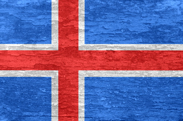 Iceland flag on an old painted wooden surface.