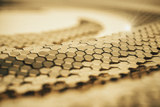 Abstract blurred gold metal cells backdrop.
