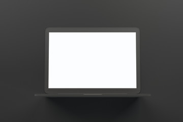 Blank white mock up screen of single material laptop at abstract dark grey background.