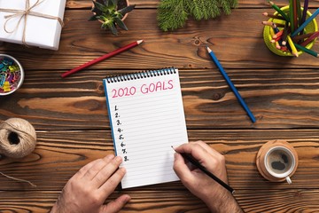 To Do list For New Year 2020, Over Head View Of Work Desk.