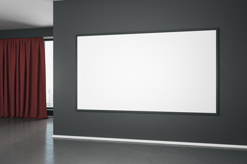 Blank white mock up poster on black wall in modern empty room with concrete floor and red curtain.