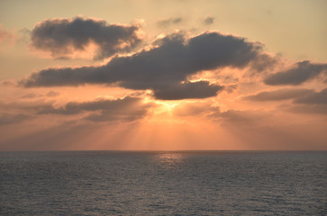 Sunrise over the sea, near Port Said, Egypt. View from the cargo ship transiting Suez Canal. 