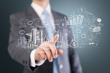 Businessman and  analytics symbols on  background