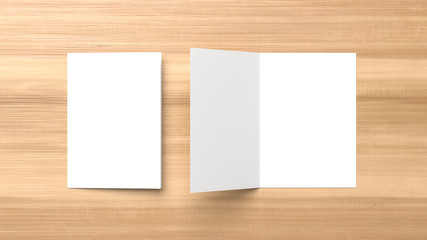 Realistic bi fold brochure or invitation mock up isolated on wooden background. 3D illustration.