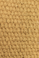 Background texture natural material braided from natural hemp, fiber from cannabis. Texture weaving of plaits