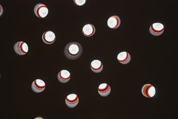 Dome of the historical Baths with day light filtering through the ceiling.