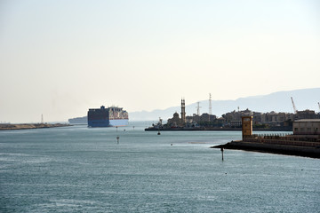 Large container ships transiting Suez Canal.