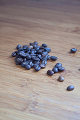 Coffee Beas in Wooden Table